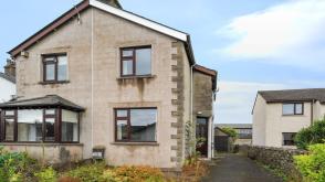 Three bedroom house in need of modernisation in Kendal photo