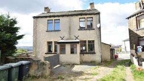 The property does require renovation in Bradford photo