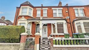 Freehold two floor mid terrace house requiring updating, photo