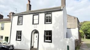 End terrace house in need of modernisation in St. Bees photo