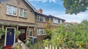 Freehold mid terrace house requiring updating in RICHMOND photo