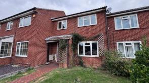 A mid terraced property requiring modernisation in Huntingdon photo