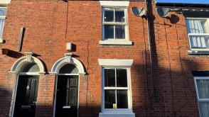 Mid terrace, which is in need of some refurbishment in Stoke-On-Trent photo