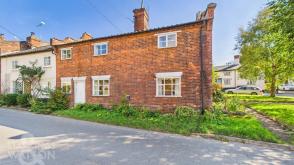 Charming Grade II cottage in need of renovation in Eye photo