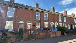A vacant terrace house in need of updating in Norwich photo