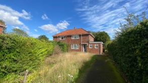Semi-detached house in need of updating in Norwich photo