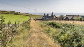 UNDER OFFER Development opportunity in Helmsdale photo