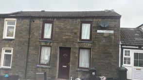 Mid Terraced House In Need of Refurbishment in Merthyr Tydfil photo