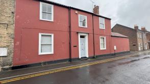 Semi detached house in need of renovation in Boston photo