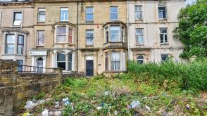 The property does require full renovation in Bradford photo