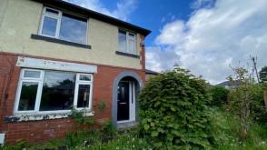 House In need of refurbishment in Bolton photo