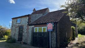 Cottage requires some updating in Norwich photo
