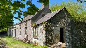 Welsh Longhouse in need of complete restoration in Llanfynydd photo
