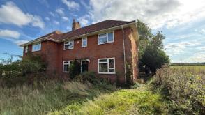 Semi detached house in need of updating in Beccles photo