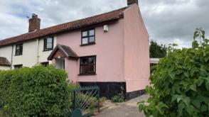 A semi-detached cottage requiring modernisation in Norwich photo