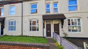 Mid-terraced house requiring updating in Sparkbrook photo