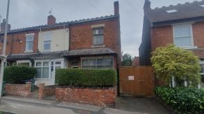 A Traditional end-terraced house requiring refurbishment in Smethwick photo