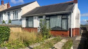 Bungalow requires a full programme of renovation in Huddersfield photo
