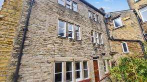 Cottage in need of a full programme of modernisation in Huddersfield photo