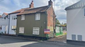 Detached cottage in need of modernisation in Fakenham photo