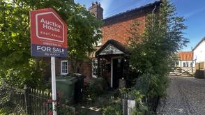Semi-detached cottage in need of some refurbishment in King's Lynn photo