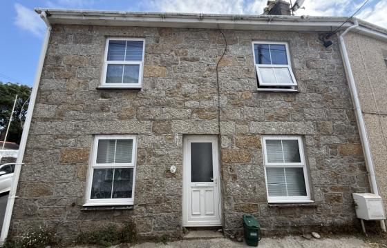 Cottage requiring updating in Penzance photo