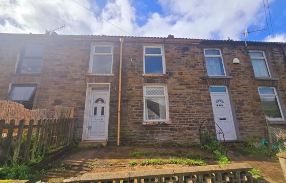 A three bedroom mid terrace property requiring renovation in Tonypandy photo