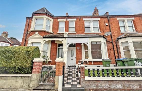 Freehold two floor mid terrace house requiring updating, photo