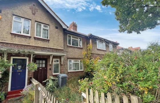 Freehold mid terrace house requiring updating in RICHMOND photo