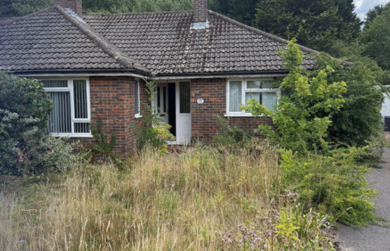 Bungalow In Need Of Modernisation in Guildford photo
