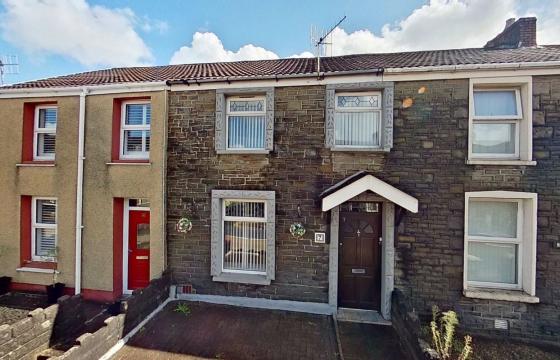 Mid terraced house requires refurbishment in Neath photo