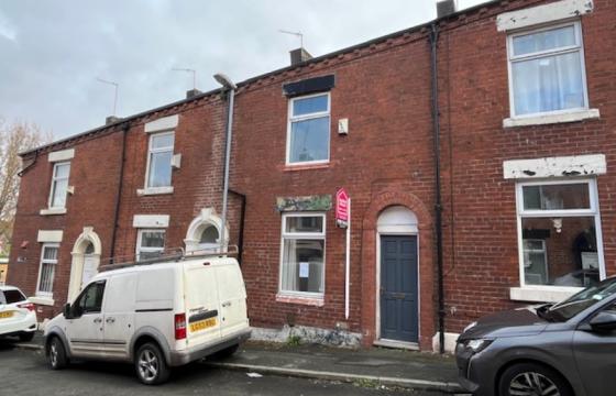 House requiring refurbishment in Oldham photo