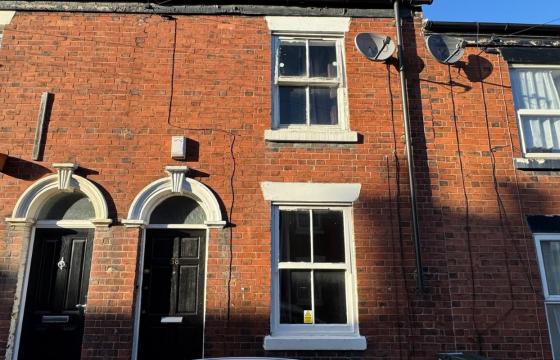 Mid terrace, which is in need of some refurbishment in Stoke-On-Trent photo