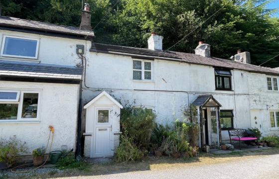 cottage is in need of modernisation in Mold photo