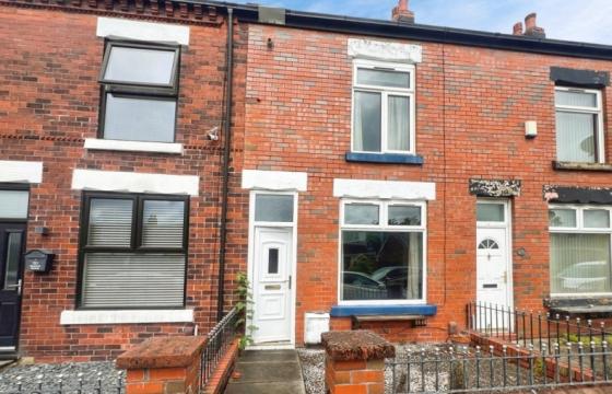 Mid-terrace property for full modernisation in Bolton photo