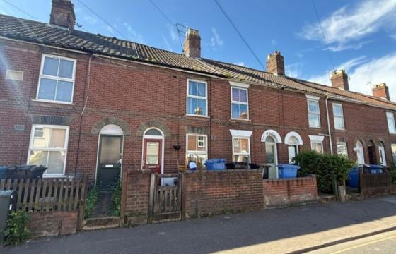 A vacant terrace house in need of updating in Norwich photo