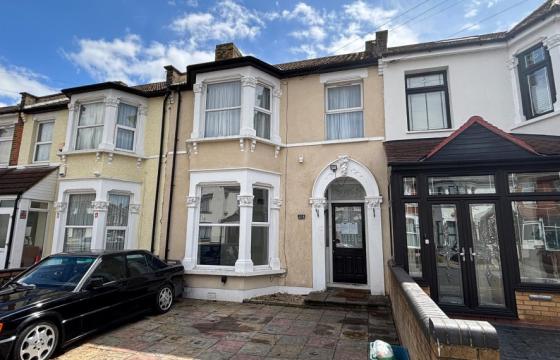 Terraced house in need or redecoration in Ilford photo