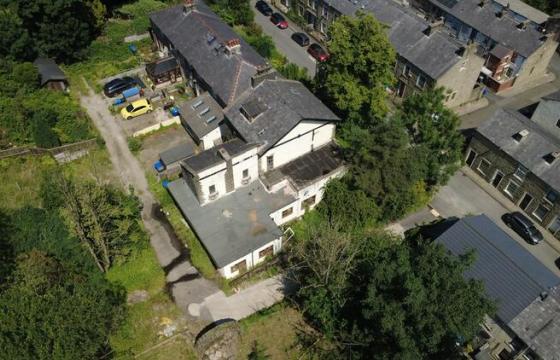 The property requires a full scheme of refurbishment in Bacup photo