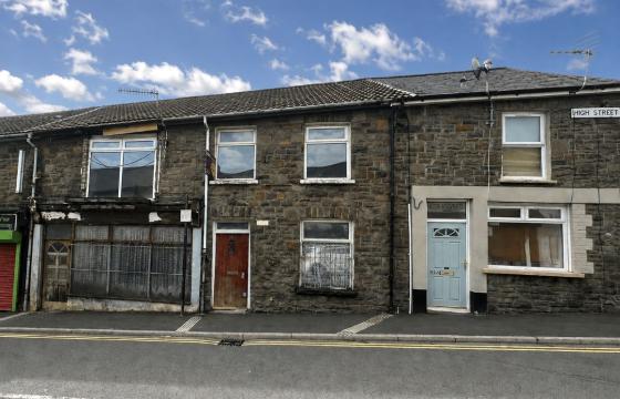 A mid terrace property in need of renovation in Ferndale photo