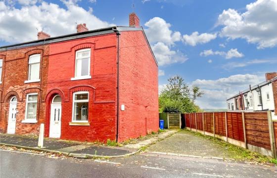 A spacious end terrace in need of modernisation in Ashton-under-Lyne photo