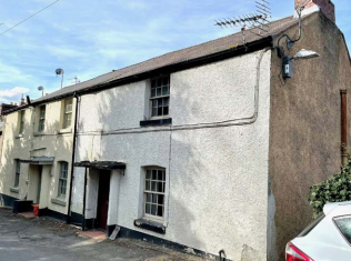 Cottage is in need of modernisation in Llangollen photo