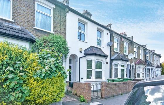 house requiring updating in London photo