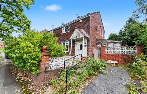House requiring refurbishment in Oldham photo